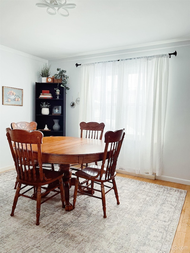 dining room with light wood-type flooring