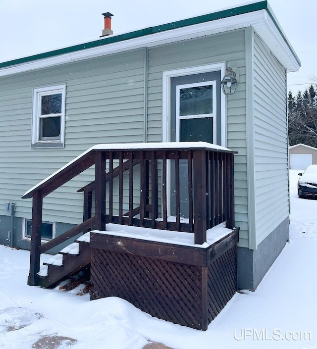 view of snow covered deck