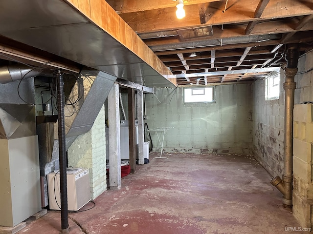 basement featuring separate washer and dryer