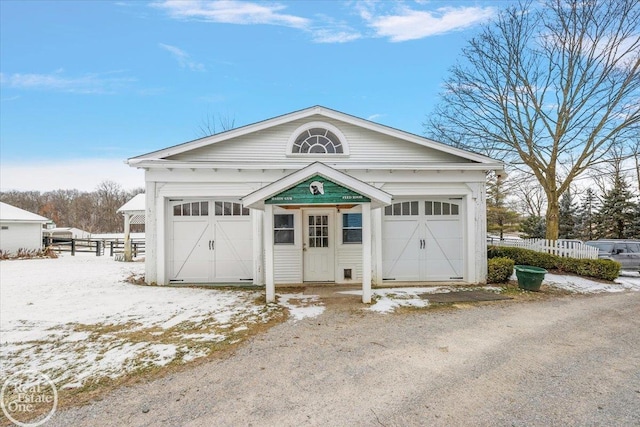 view of snow covered garage