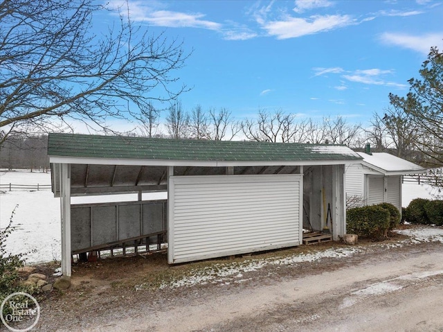 exterior space with a carport