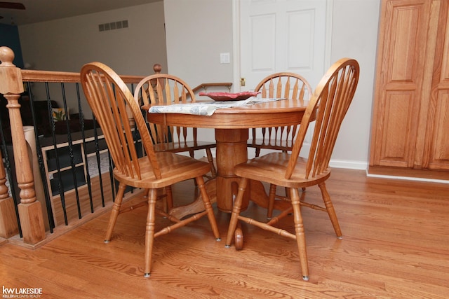 dining room with light wood-type flooring