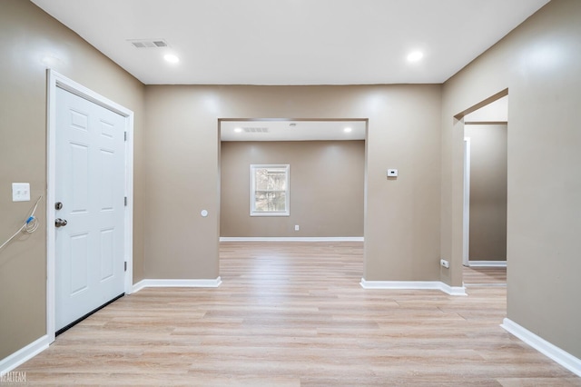 foyer entrance featuring light wood-type flooring