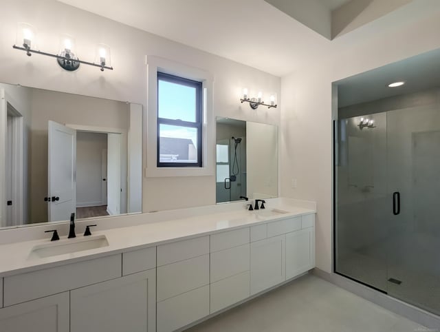 bathroom featuring vanity and walk in shower