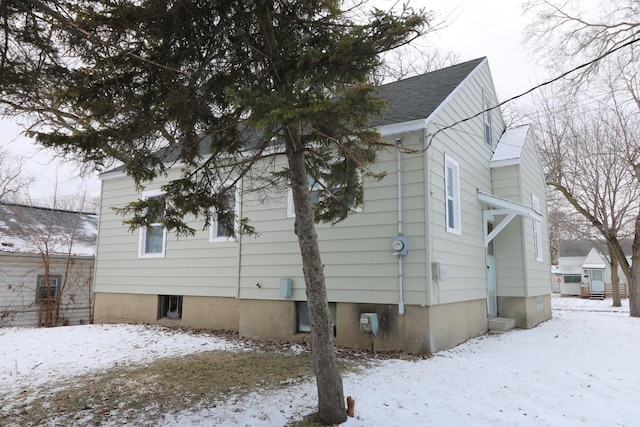 view of snow covered property