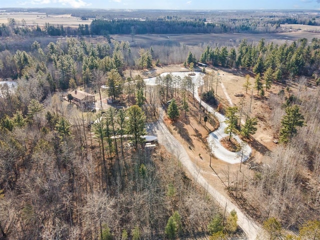 birds eye view of property with a rural view