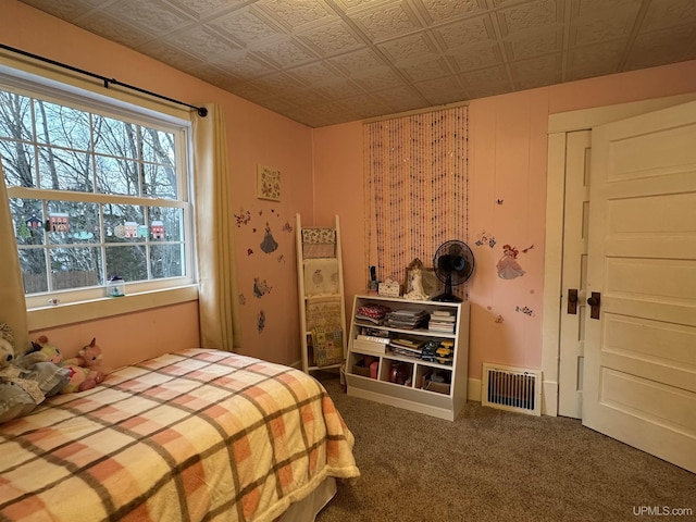 bedroom featuring carpet