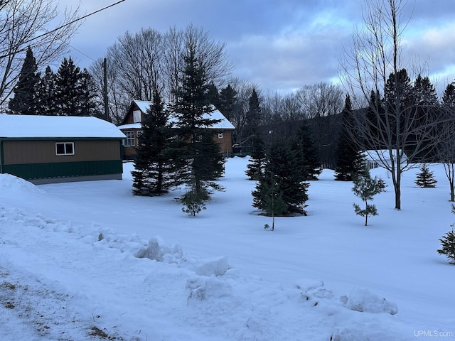 view of yard covered in snow