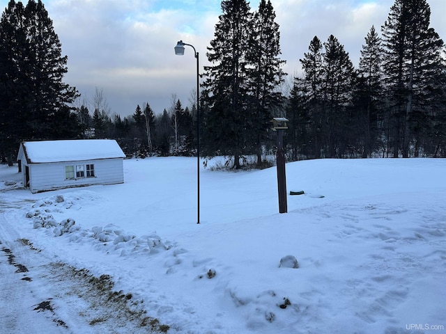 view of yard covered in snow