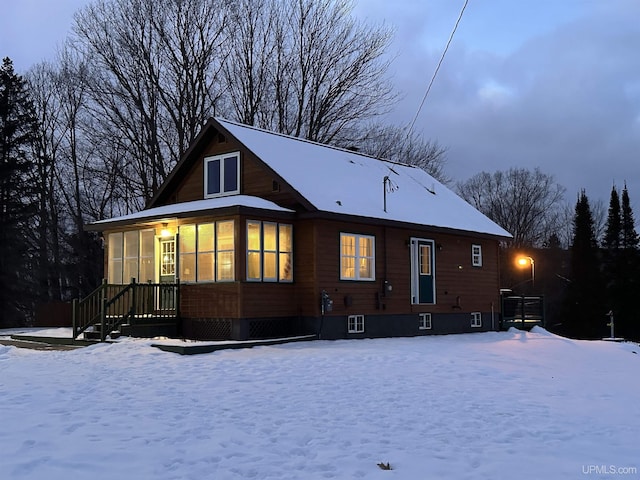 view of snow covered property