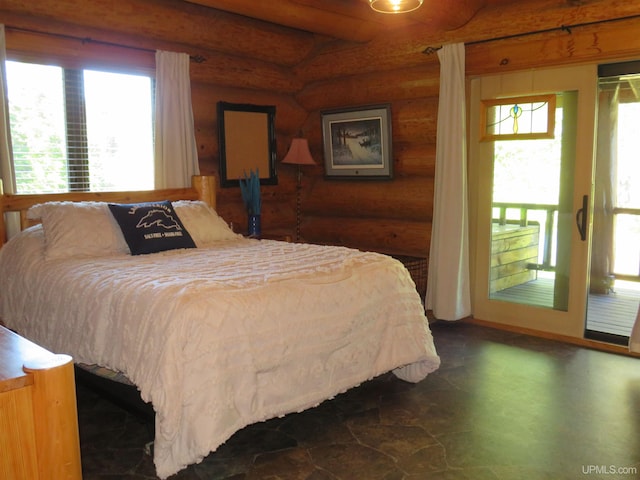 bedroom featuring rustic walls