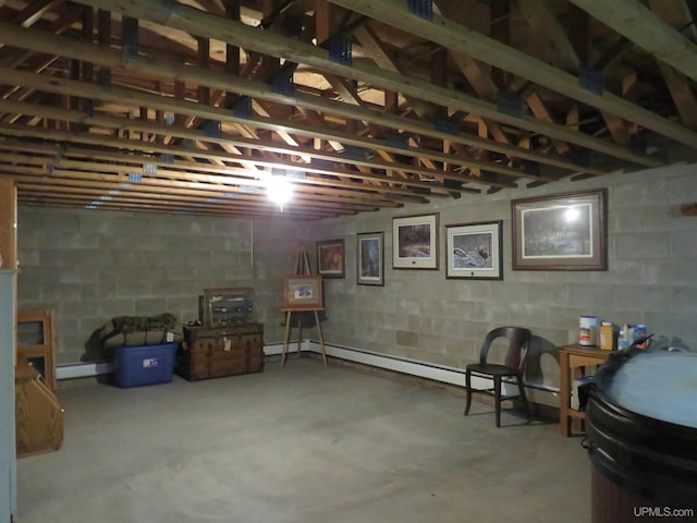 basement featuring baseboard heating