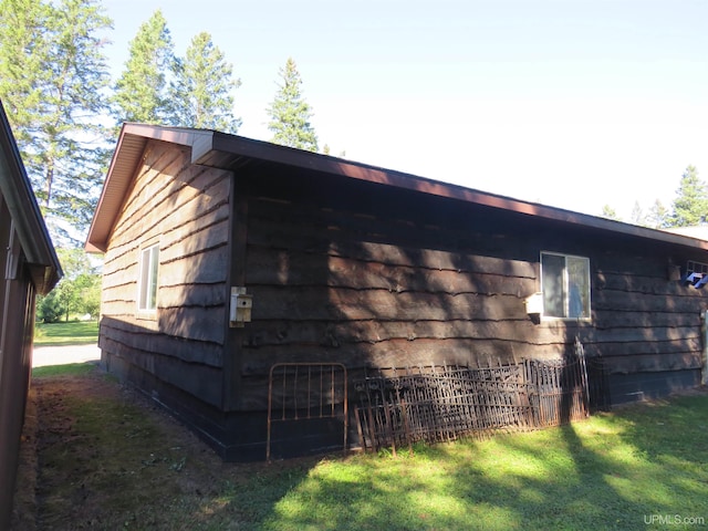 view of outdoor structure featuring a yard