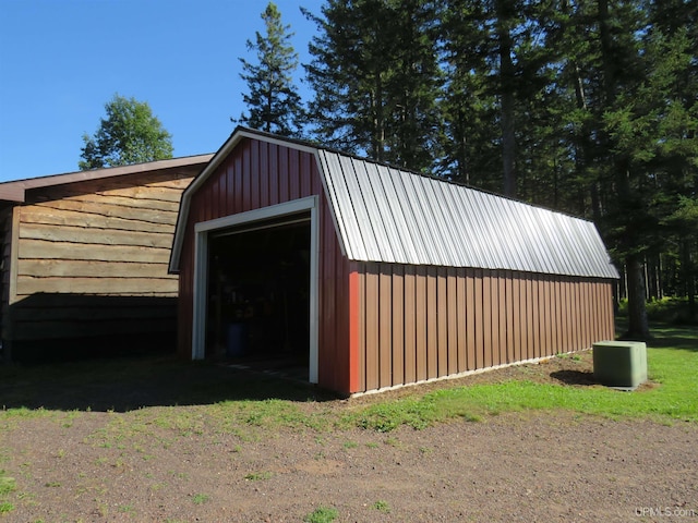 view of outbuilding with a garage