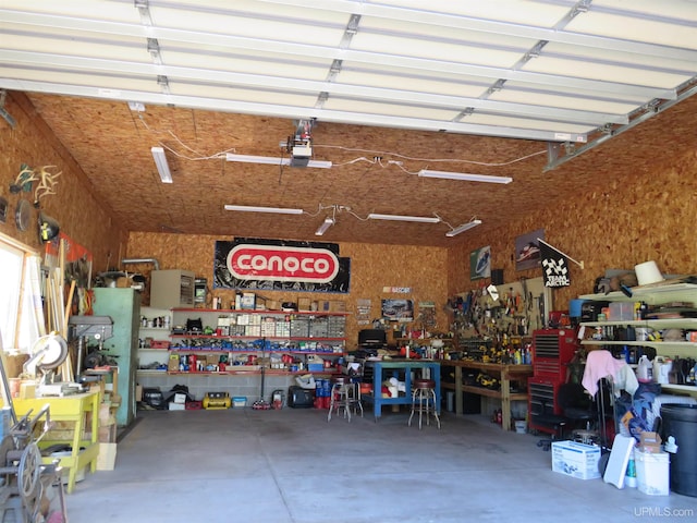 garage with a workshop area