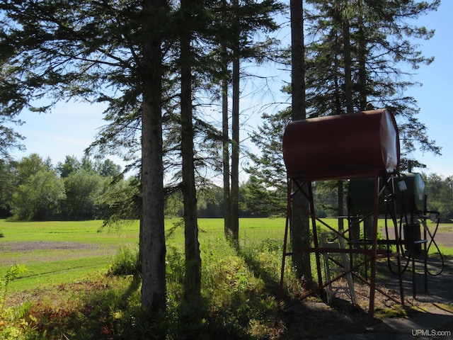 surrounding community featuring a lawn