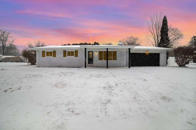 single story home featuring a garage