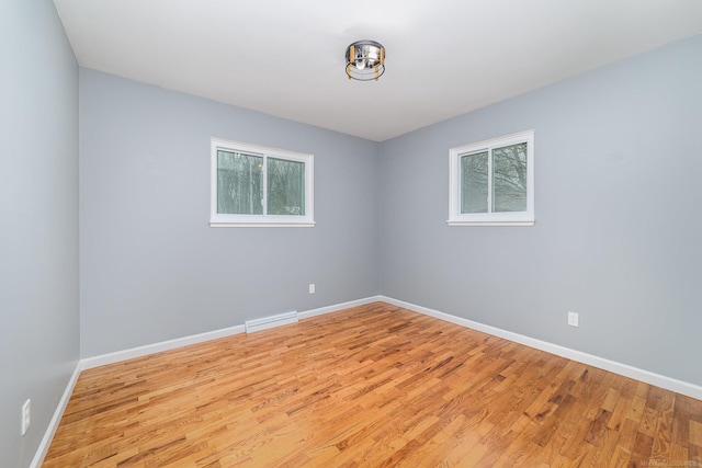 empty room featuring light hardwood / wood-style flooring