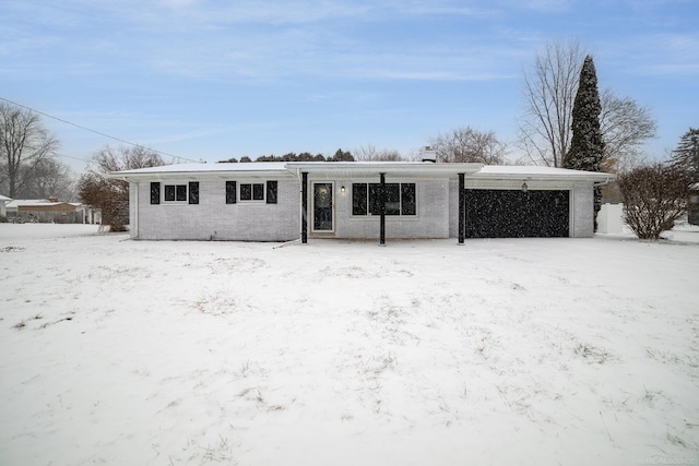 ranch-style home with a garage