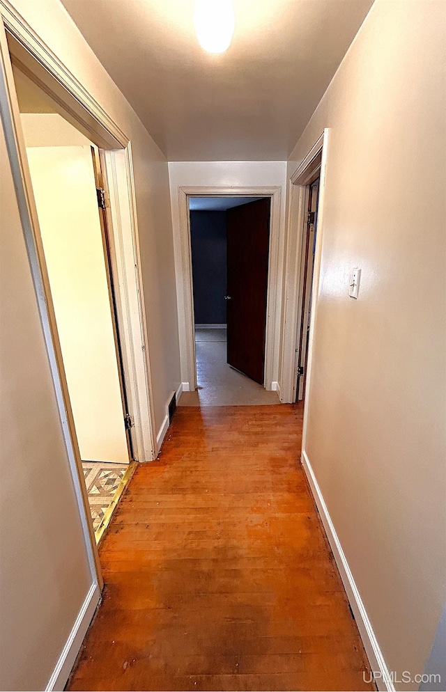 hallway featuring light wood-type flooring