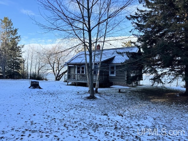 view of snow covered property