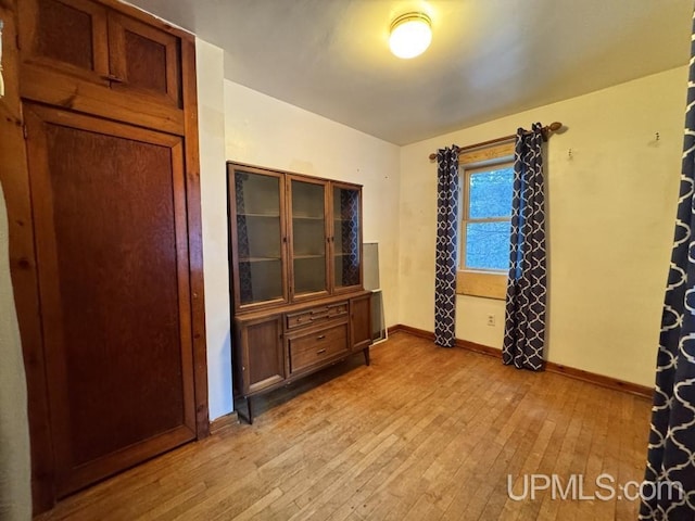 unfurnished bedroom featuring light hardwood / wood-style flooring