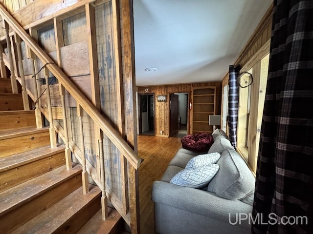 stairway with wooden walls