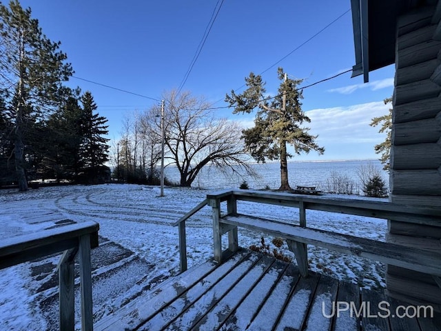 view of snow covered deck