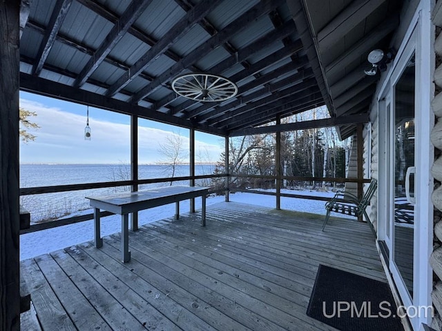 view of dock with a deck with water view