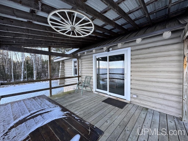 view of snow covered deck