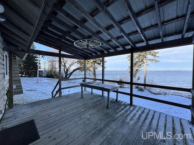 view of dock featuring a deck with water view