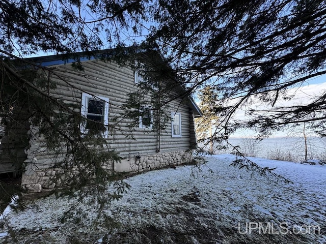 view of snow covered property