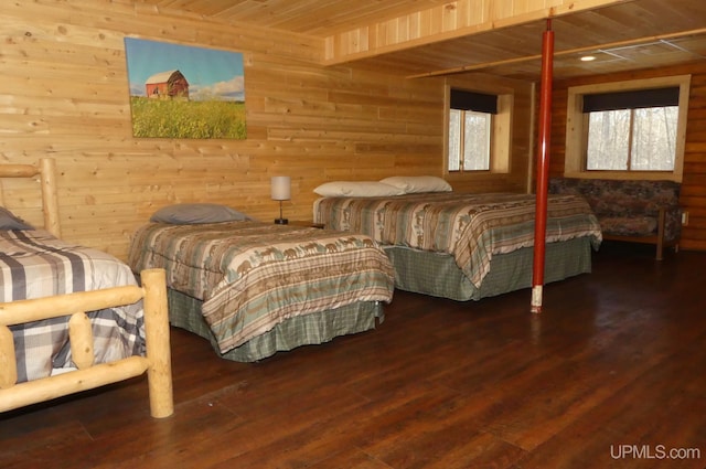 bedroom with wood-type flooring, wood walls, and wood ceiling