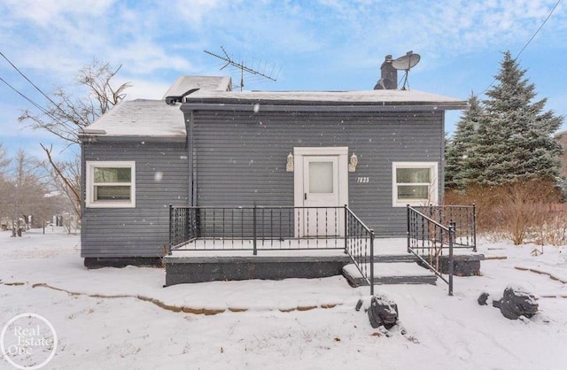 view of snow covered property