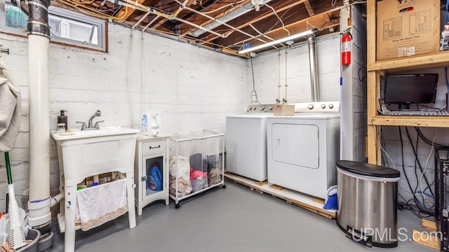 laundry room featuring washing machine and clothes dryer