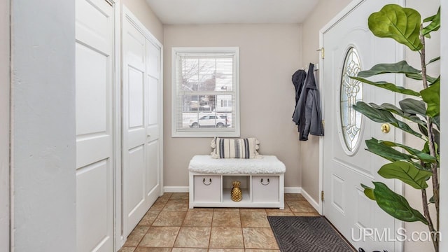 mudroom featuring light tile patterned floors