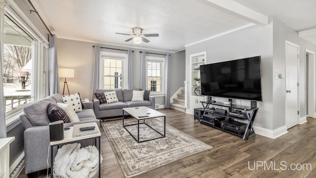 living room featuring ceiling fan, dark hardwood / wood-style flooring, built in features, and ornamental molding