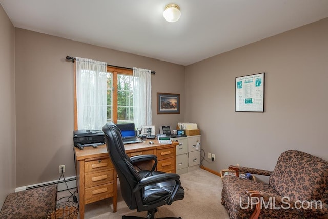 office space featuring light colored carpet and a baseboard heating unit