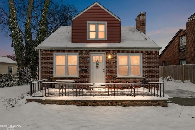 view of front of house featuring cooling unit