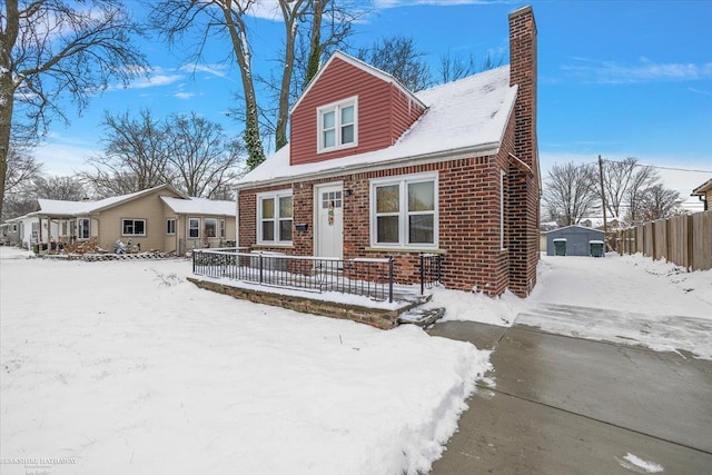 view of new england style home