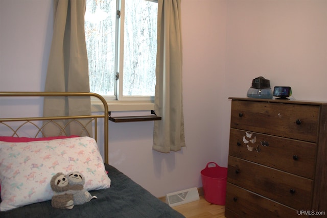 bedroom featuring hardwood / wood-style flooring