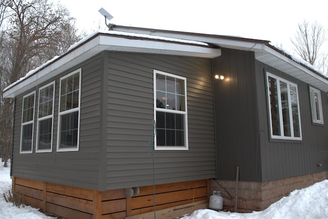 view of snow covered property