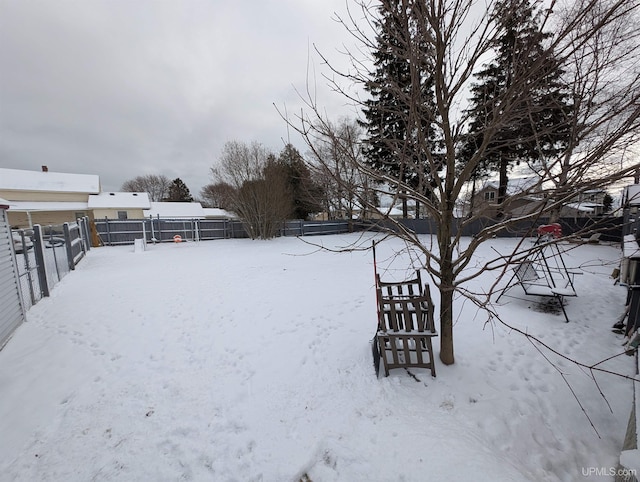 view of yard covered in snow