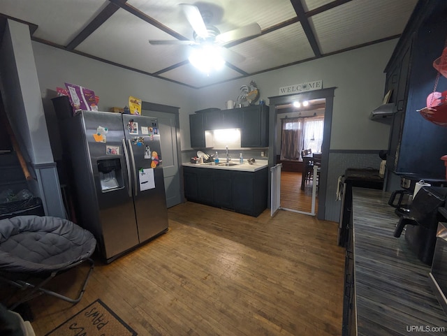 kitchen with ceiling fan, sink, stainless steel refrigerator with ice dispenser, and hardwood / wood-style flooring