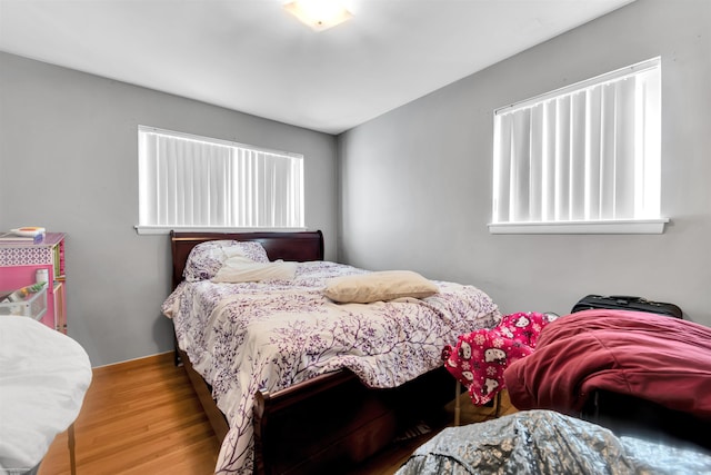 bedroom featuring hardwood / wood-style flooring