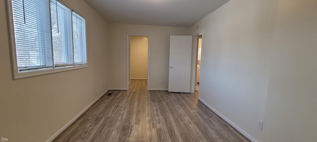 interior space with hardwood / wood-style flooring