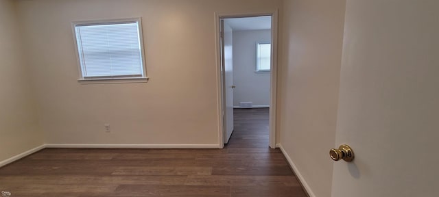 interior space with dark wood-type flooring