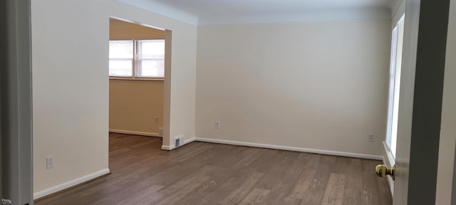 empty room featuring hardwood / wood-style floors