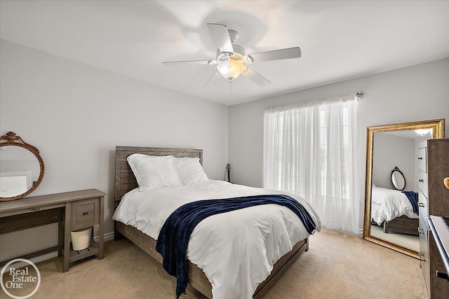 bedroom featuring ceiling fan and light colored carpet