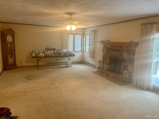 living room with baseboard heating, ceiling fan, and carpet flooring